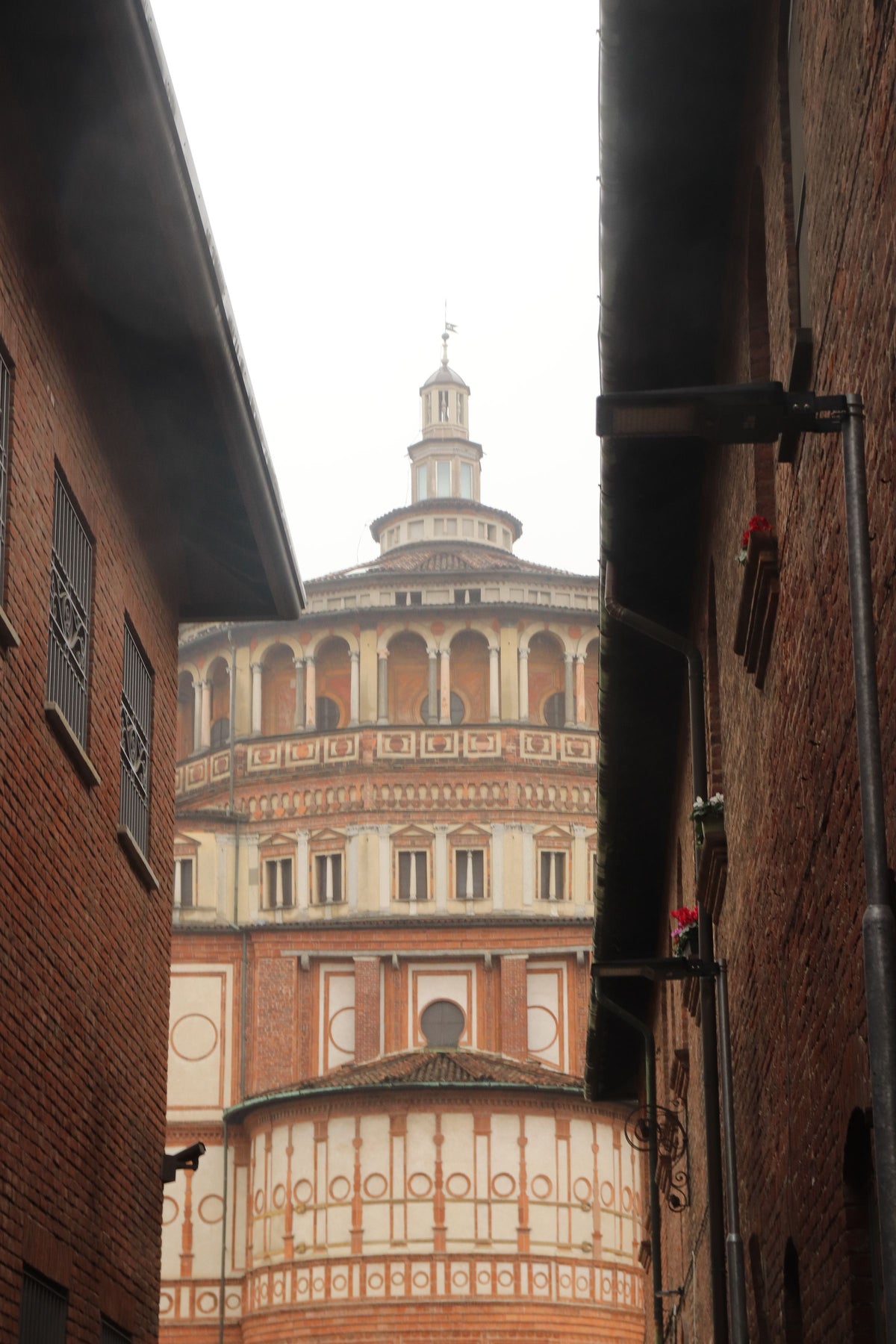 Santa Maria delle Grazie seen through a narrow alley