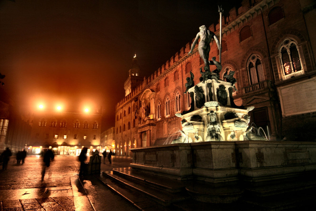 The Neptune Fountain illuminated at night
