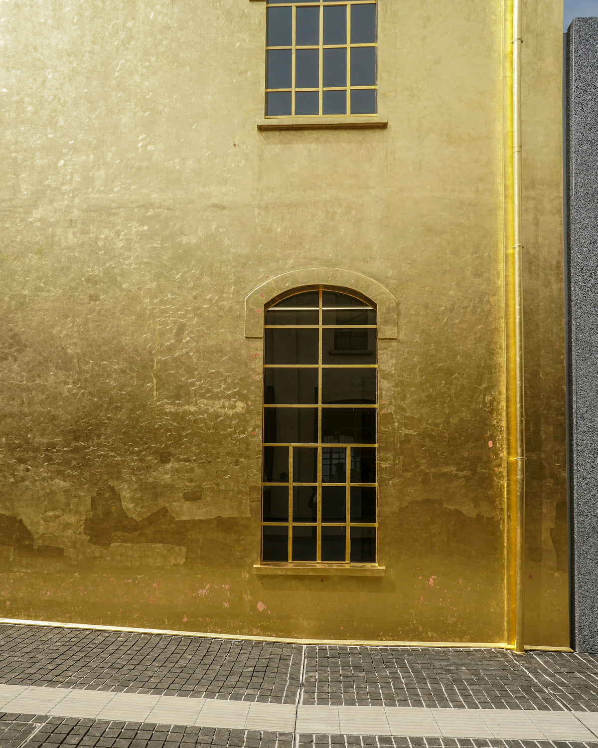 The gold-clad building at Fondazione Prada