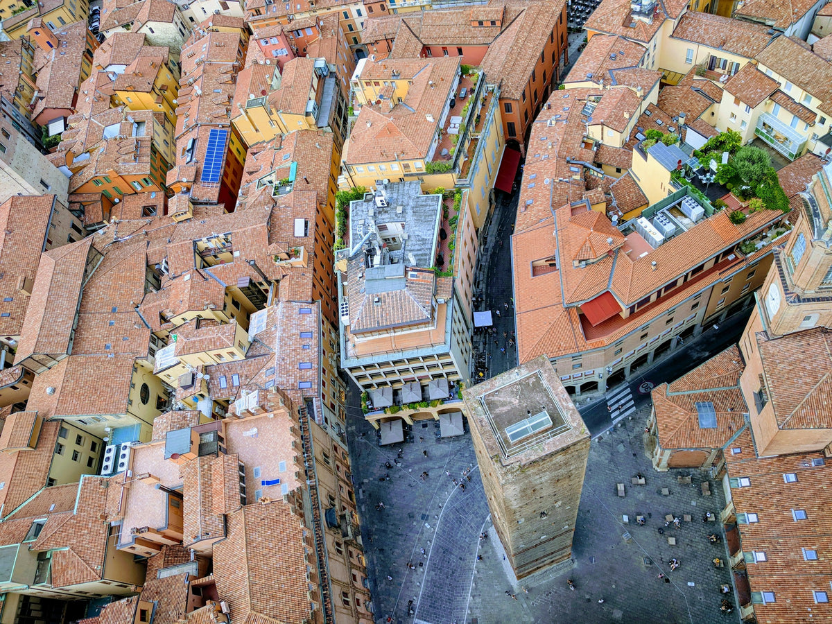 An aerial view of the smaller of Bologna's two towers
