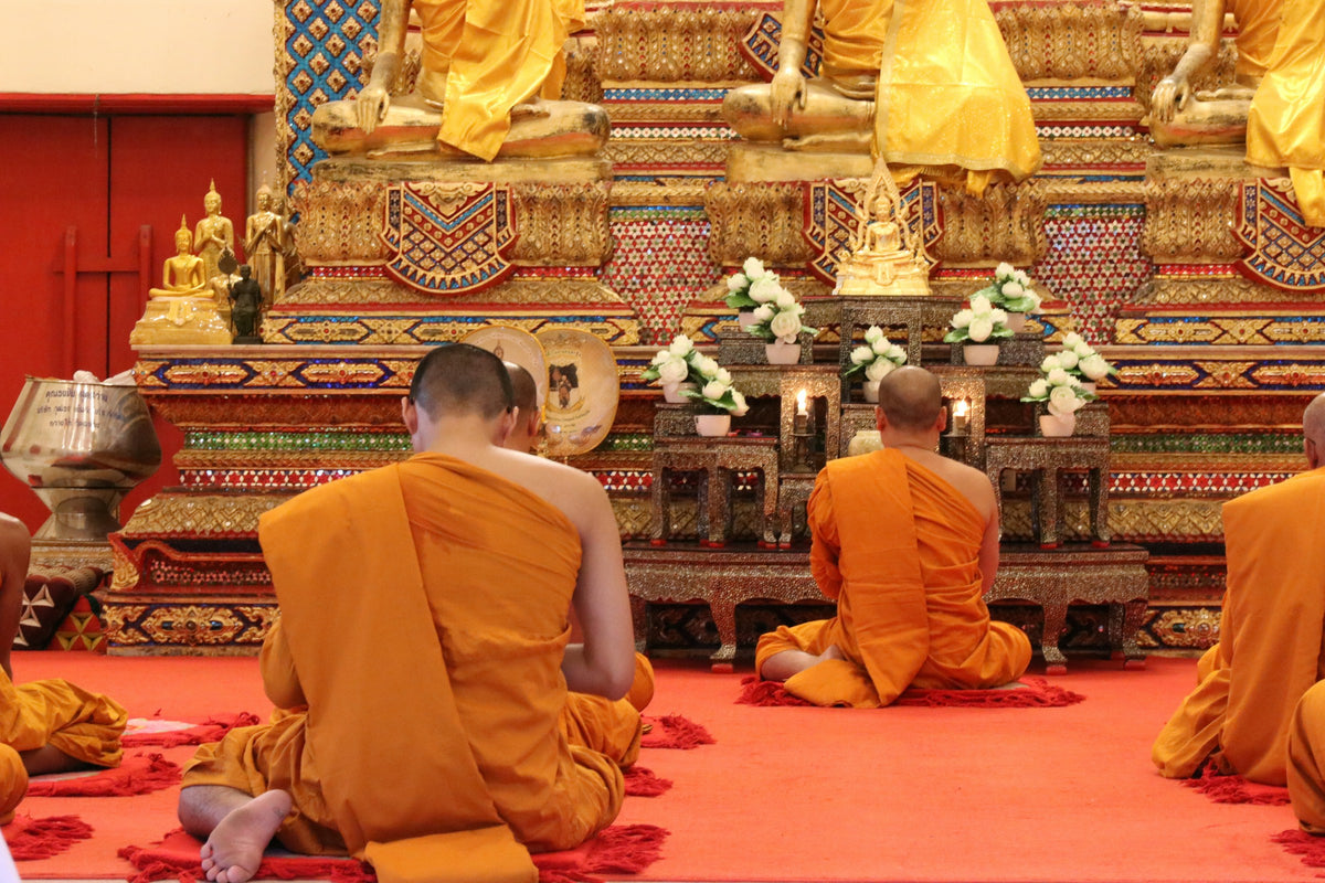 Monks at evening prayers in Wat Chalong, Phuket