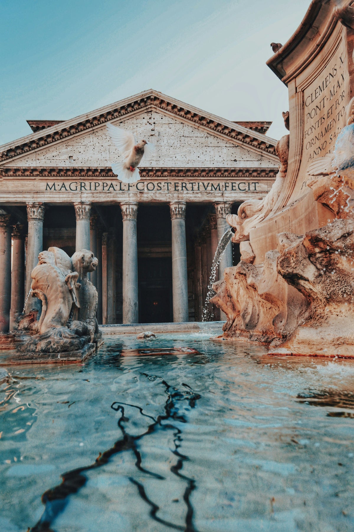 The Pantheon's portico behind the fountain in Piazza della Rotonda