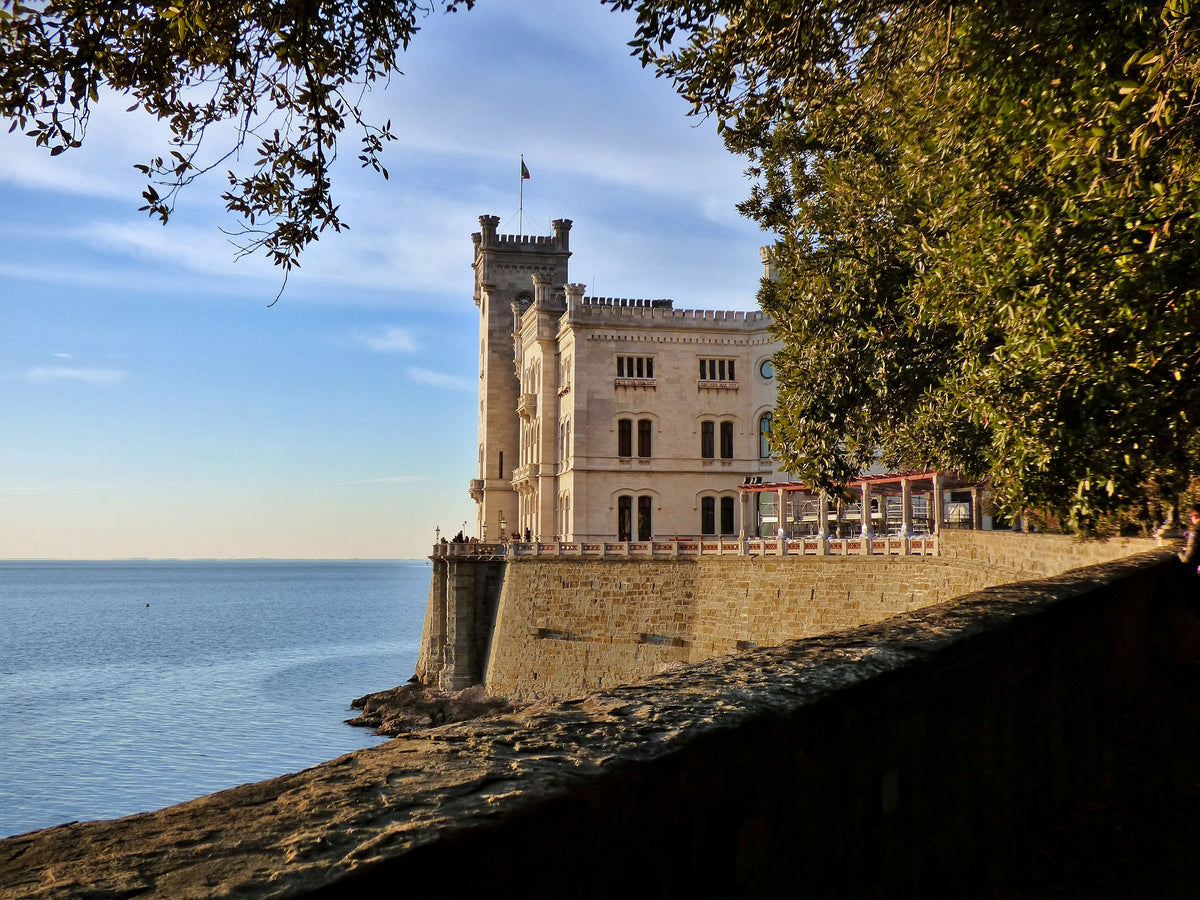 Miramare Castle framed by trees