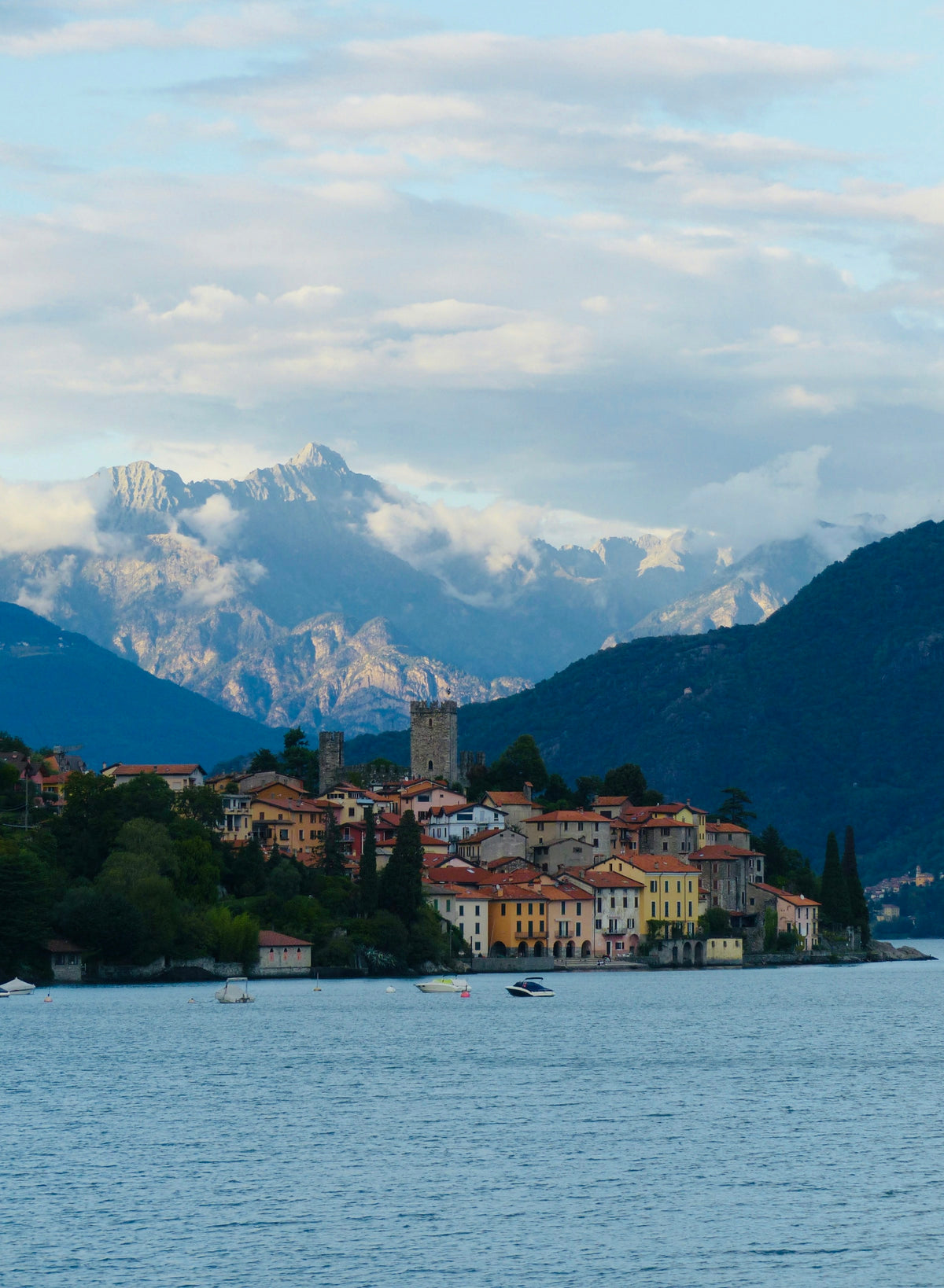 Menaggio's lakefront buildings under a blue sky