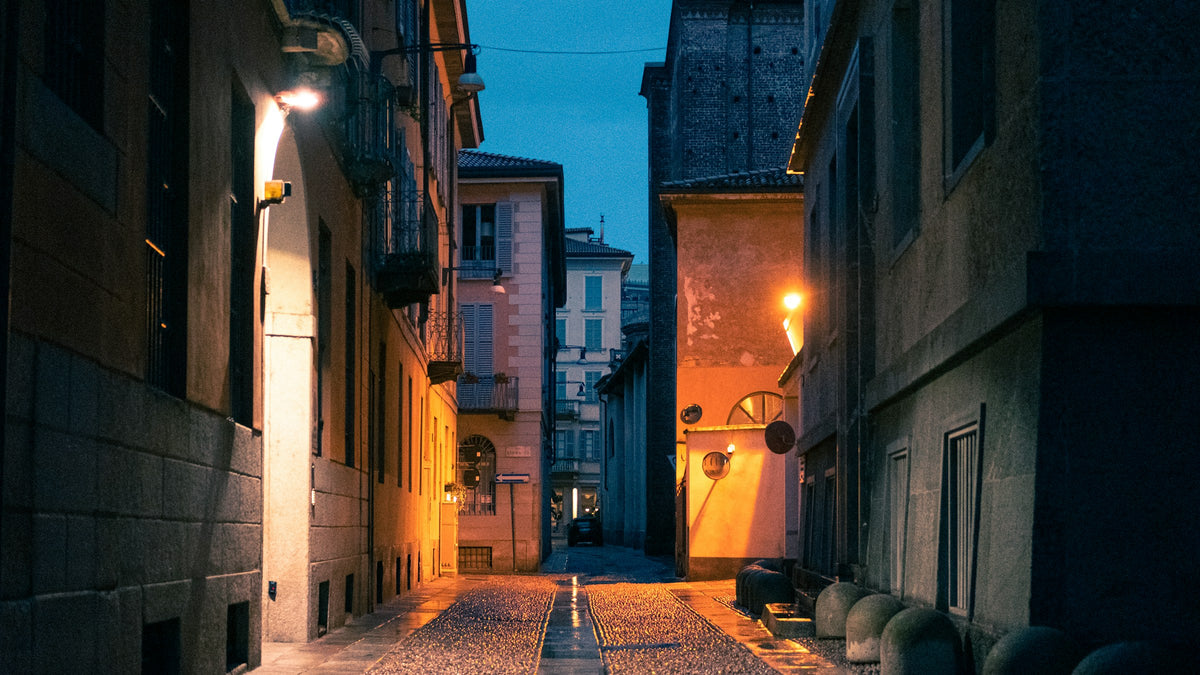 An empty Milan street at night
