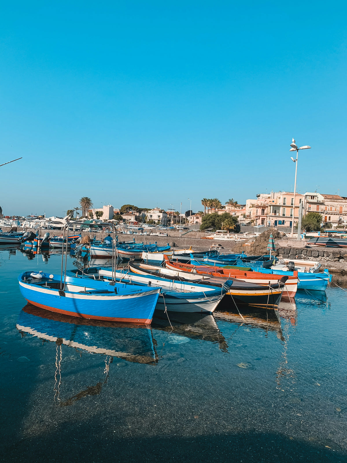 Painted fishing boats in Aci Trezza harbour