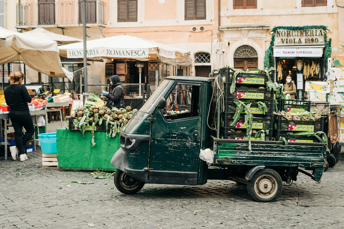 An Ape van loaded with produce at the Campo de' Fiori market
