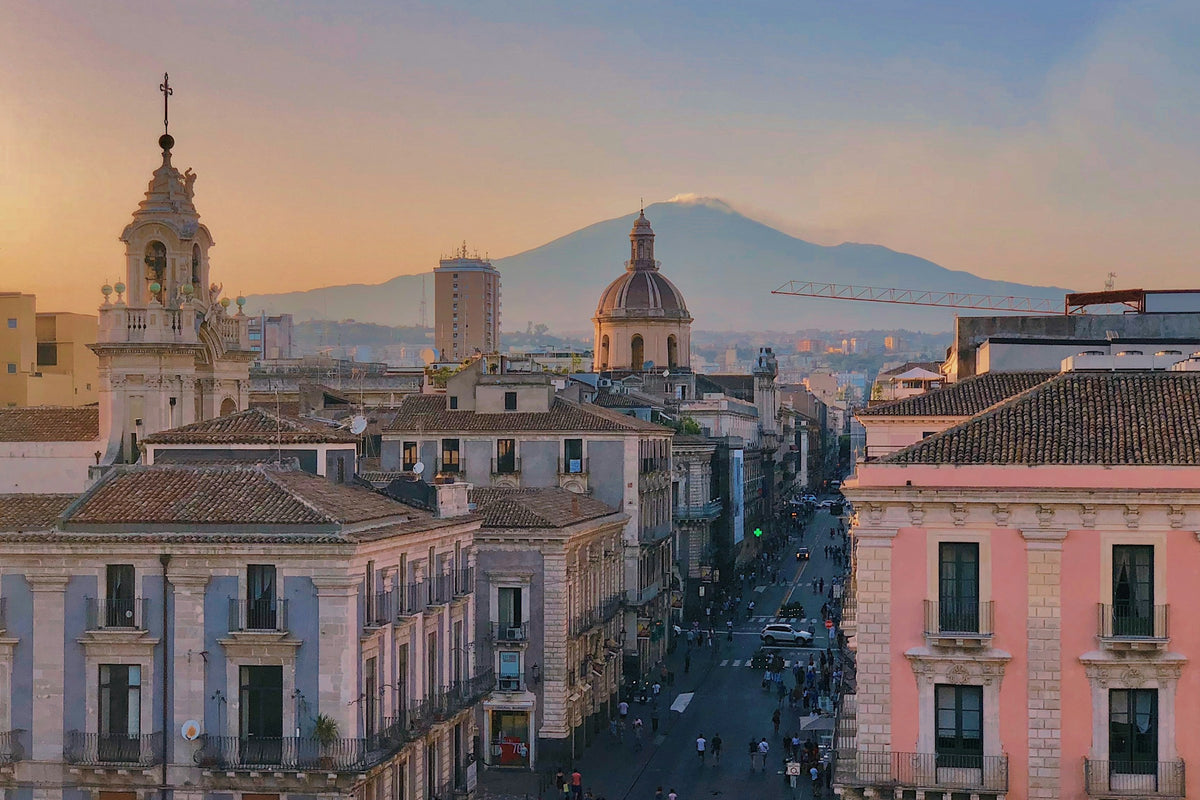 Via Etnea at sunset with Mount Etna on the horizon