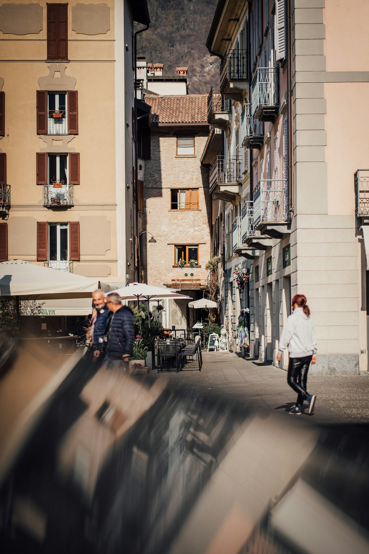 Passers-by on an old-town street