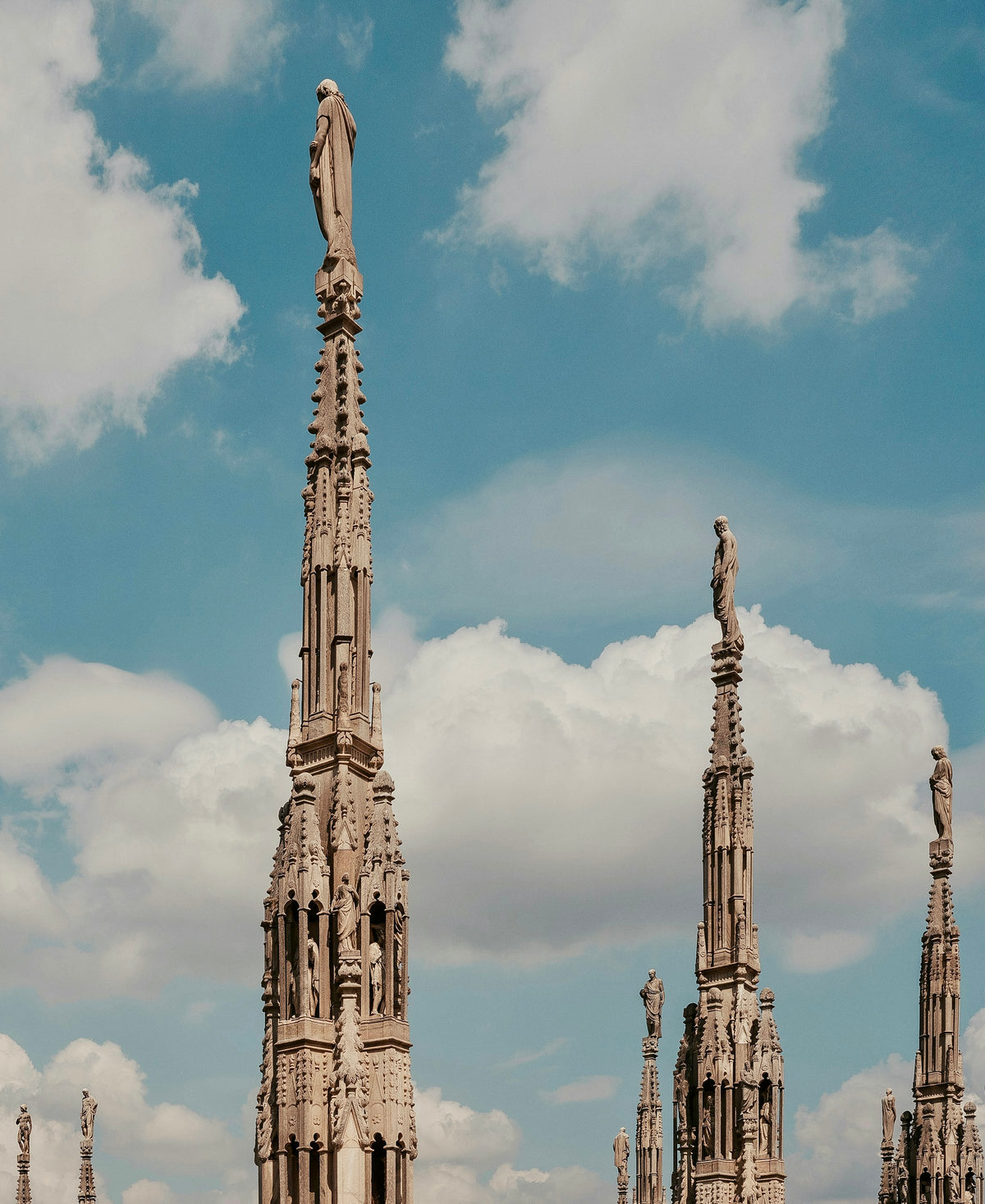 Statues and spires on the rooftop of the Duomo