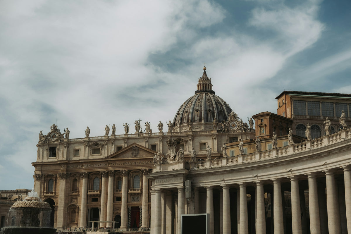 St Peter's Basilica and Bernini's colonnade under a stormy sky