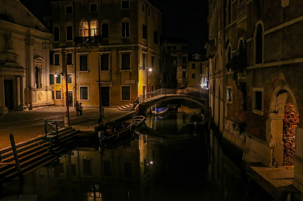 Bridge over a Venice canal at night