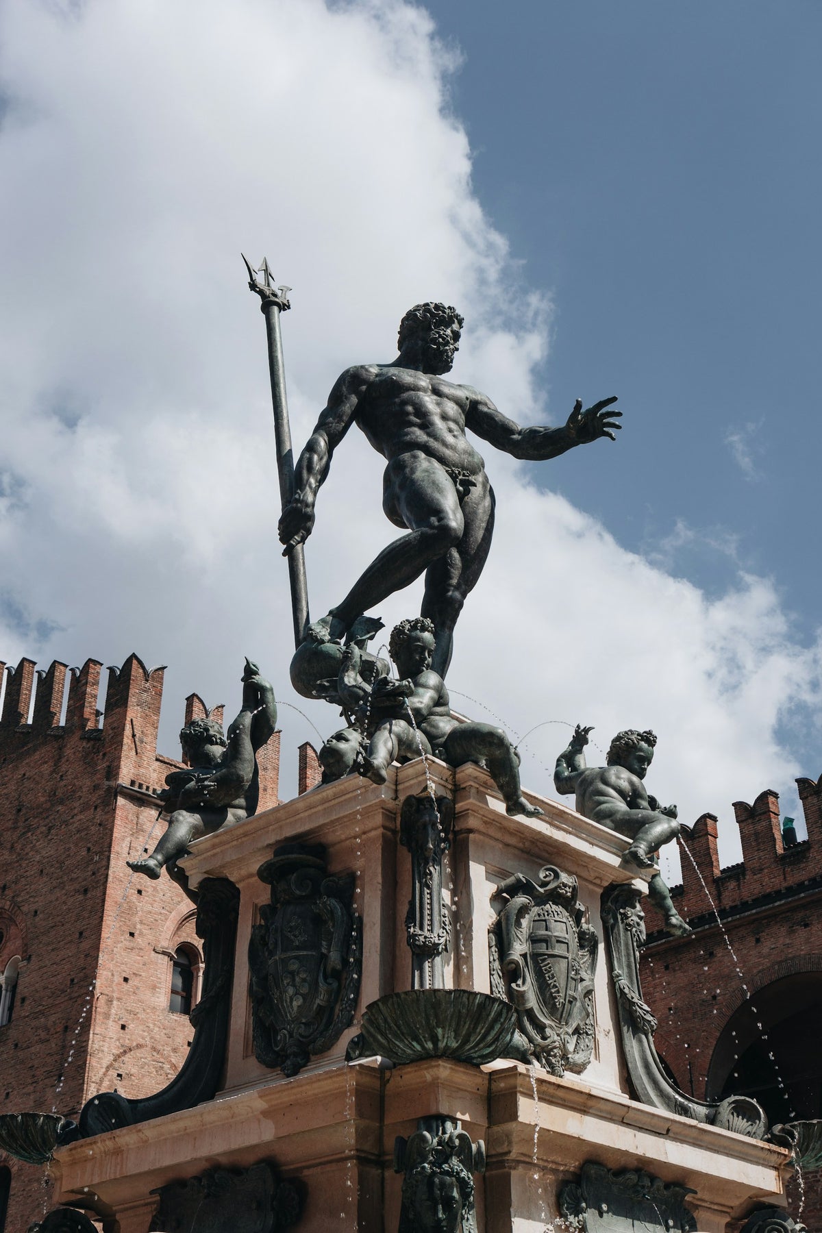 Neptune with his trident atop the fountain in Bologna