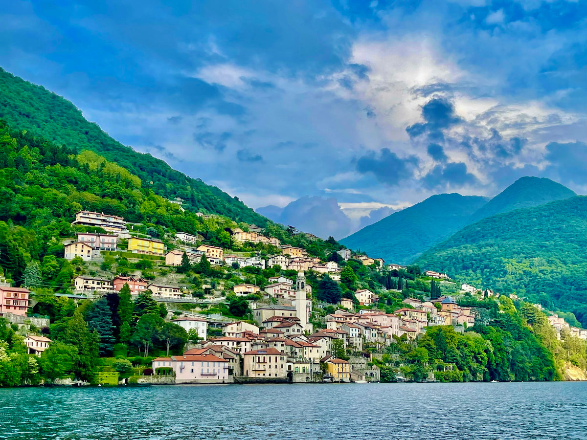 Nesso clinging to the mountainside above the lake