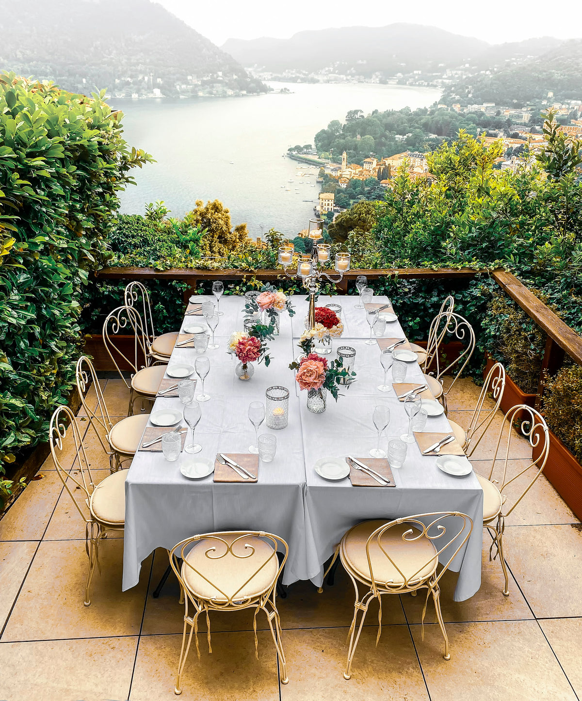 An outdoor table for ten overlooking the lake at Il Gatto Nero, Cernobbio