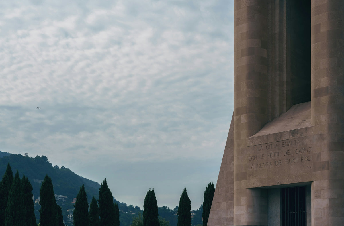 Rationalist concrete against a cloudy sky