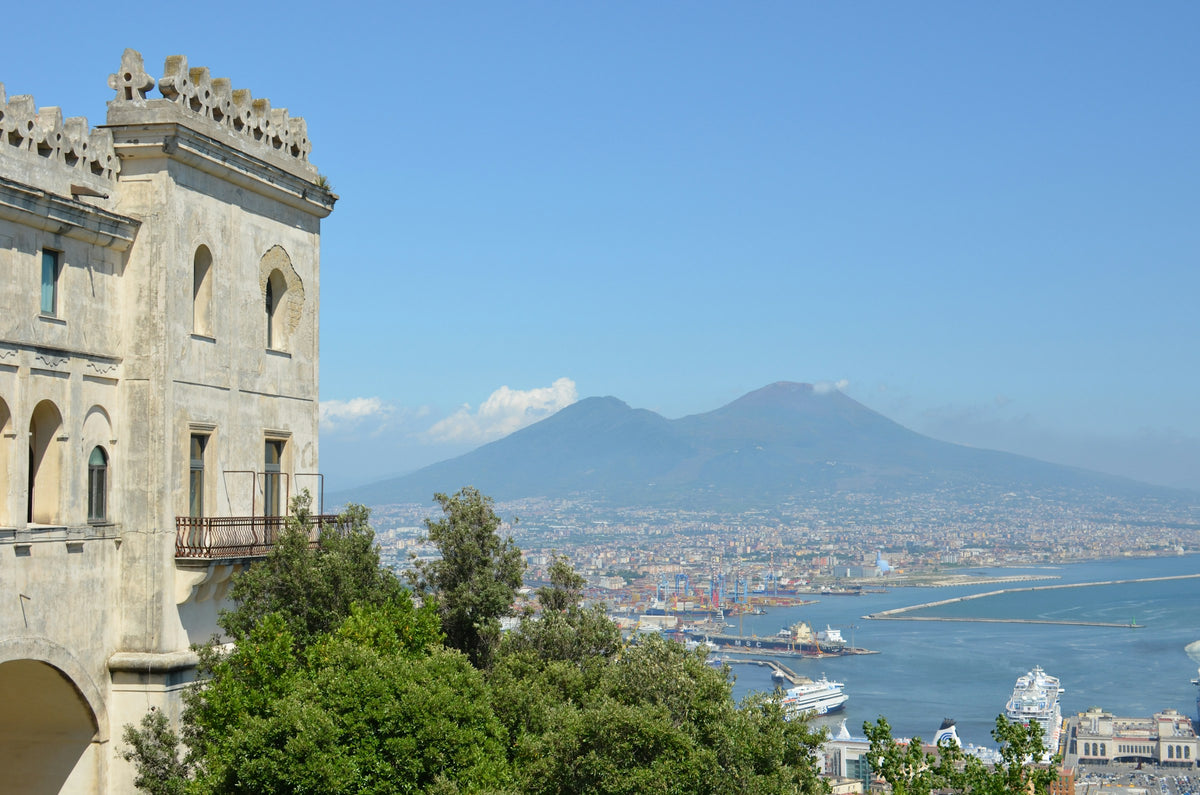 Vesuvius and the port framed by a hilltop building