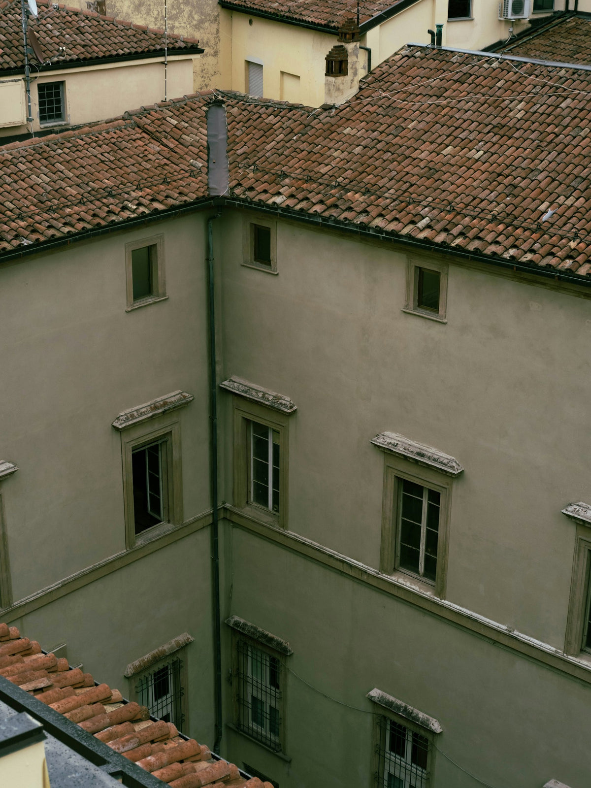A rooftop view across the buildings of Bologna