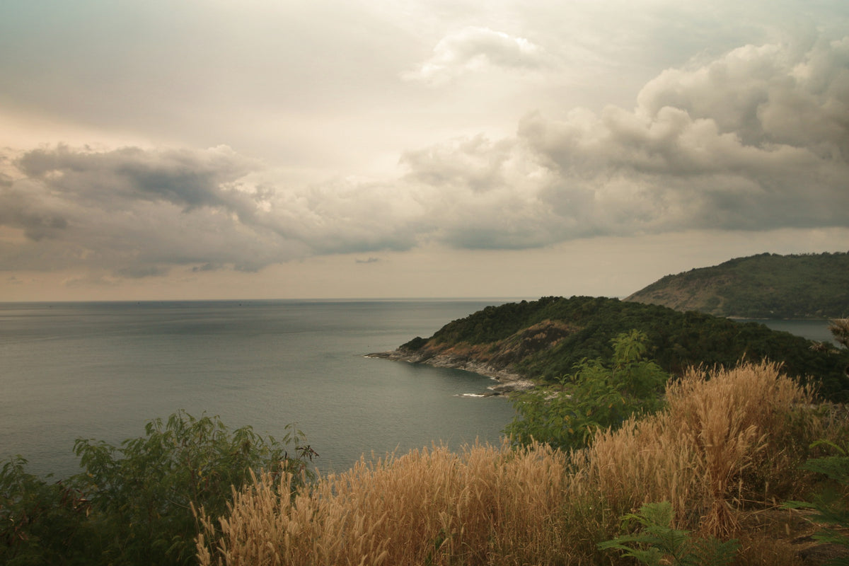 Promthep Cape headland under a cloudy sky