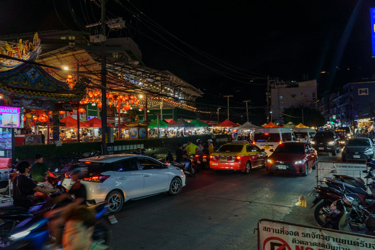 Food vendors on a busy street at night in Patong