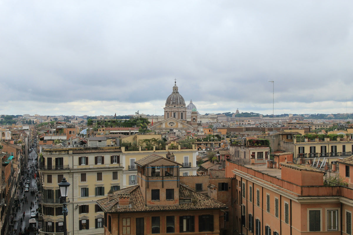 The rooftops of Rome with the dome of St Peter's in the distance