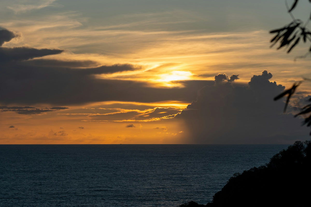 Sunset over the Andaman Sea from Promthep Cape