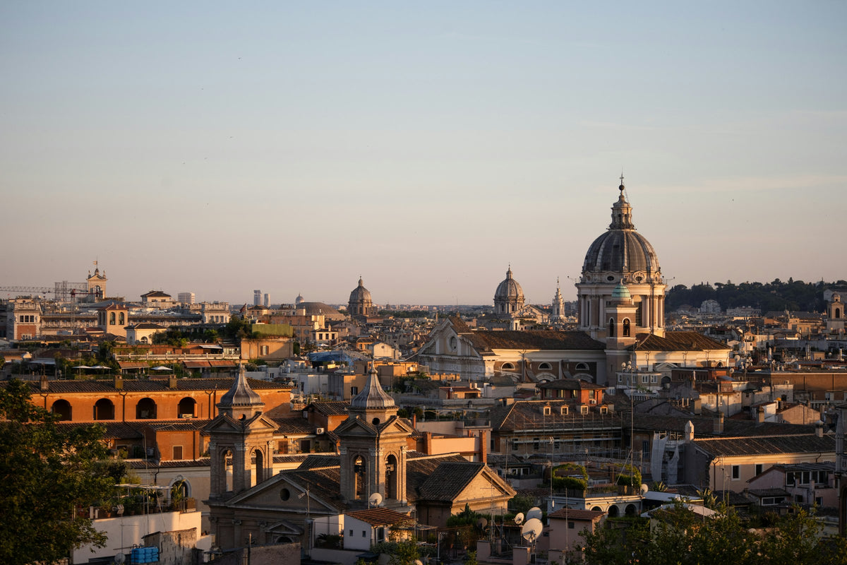 Rome's domes and bell towers in golden-hour haze