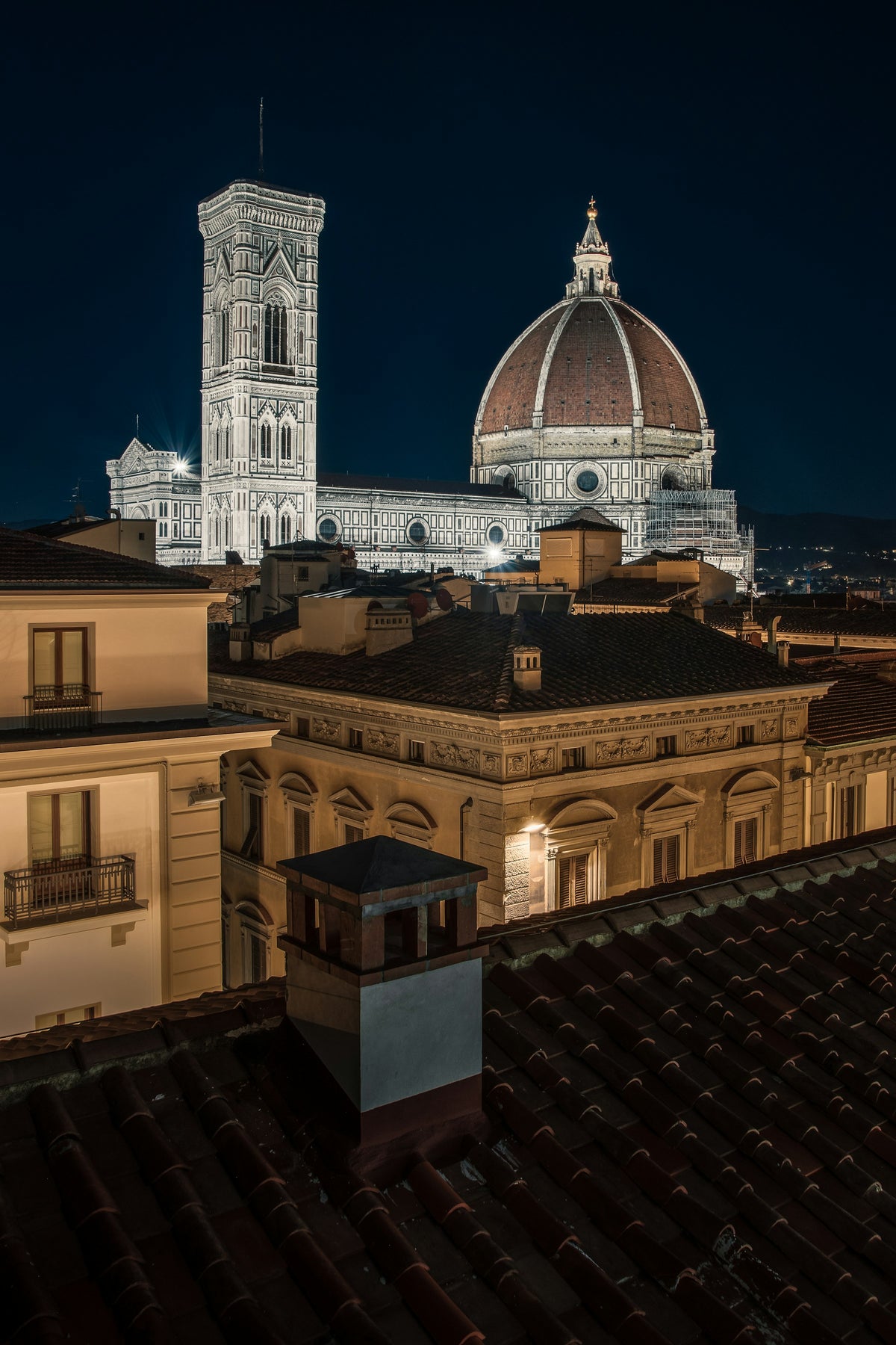 Florence Cathedral and Giotto's bell tower lit up at night