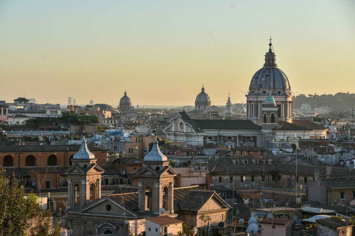 Rooftops and church domes of the historic centre at sunset