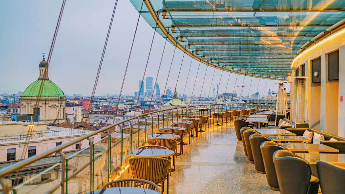 A rooftop restaurant overlooking Milan