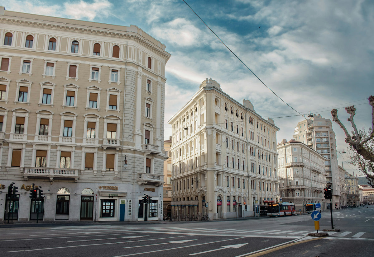 A wide boulevard with buses