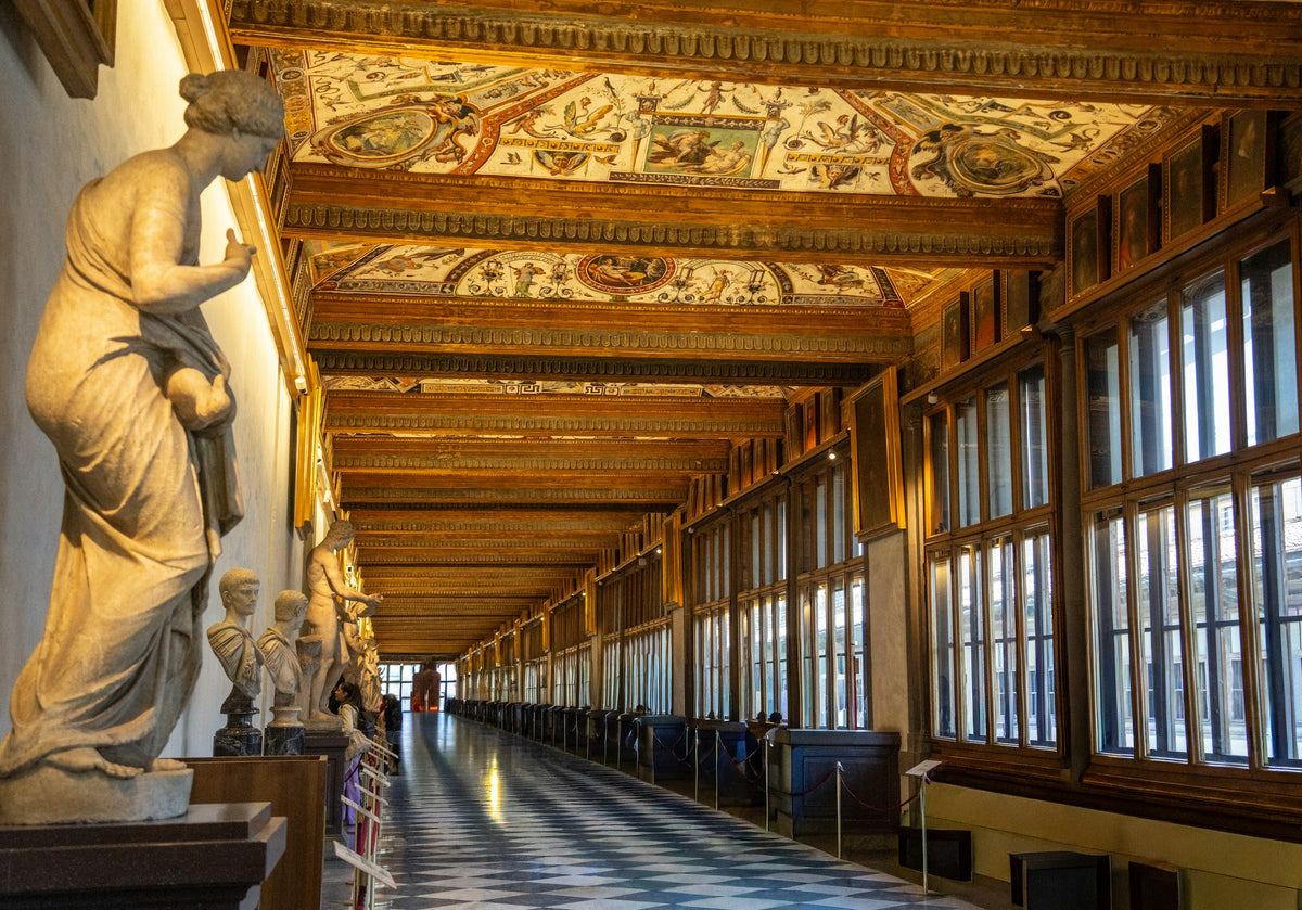 A corridor of the Uffizi lined with classical statues