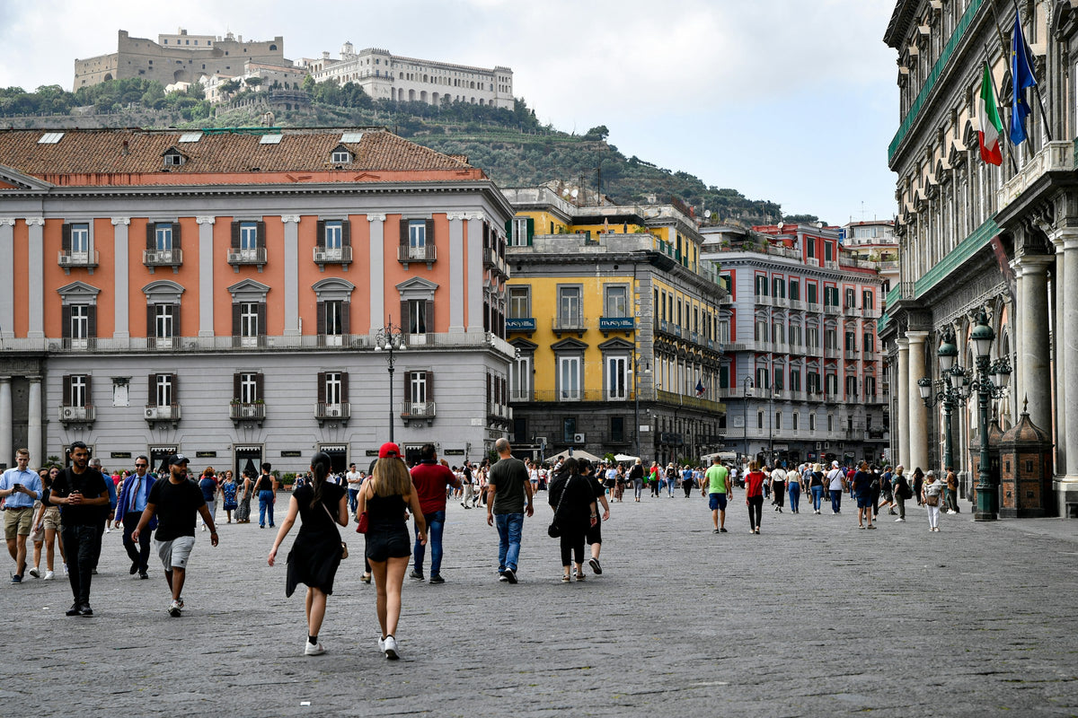 Strolling near Piazza del Plebiscito, Castel Sant'Elmo above