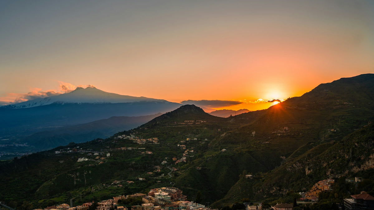 Sunset behind Etna seen from Taormina
