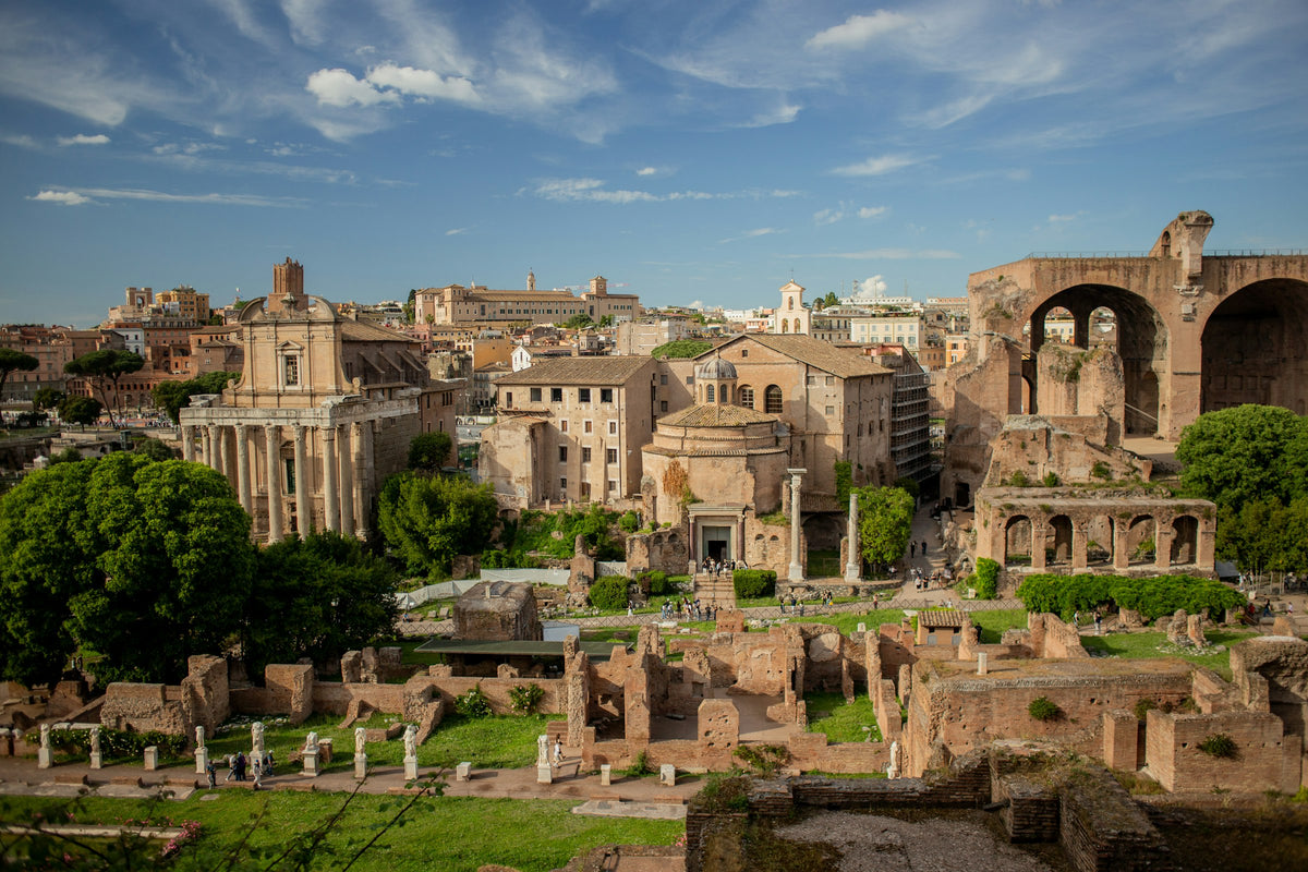 Ruins of the Roman Forum under a blue sky