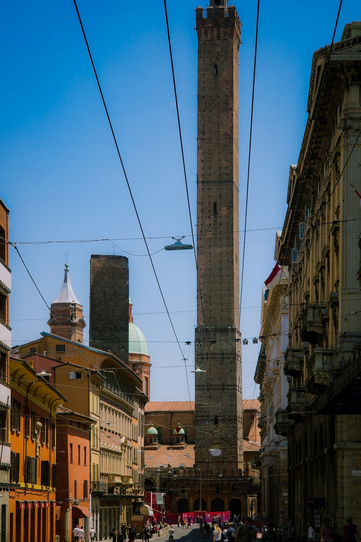 Bologna's historic towers under a clear sky