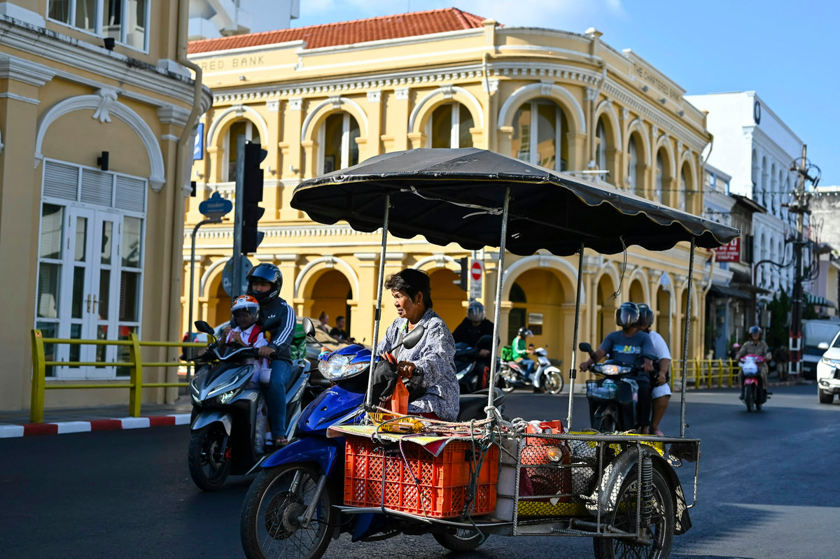 Street vendor on a motorcycle sidecar cart in Phuket Old Town