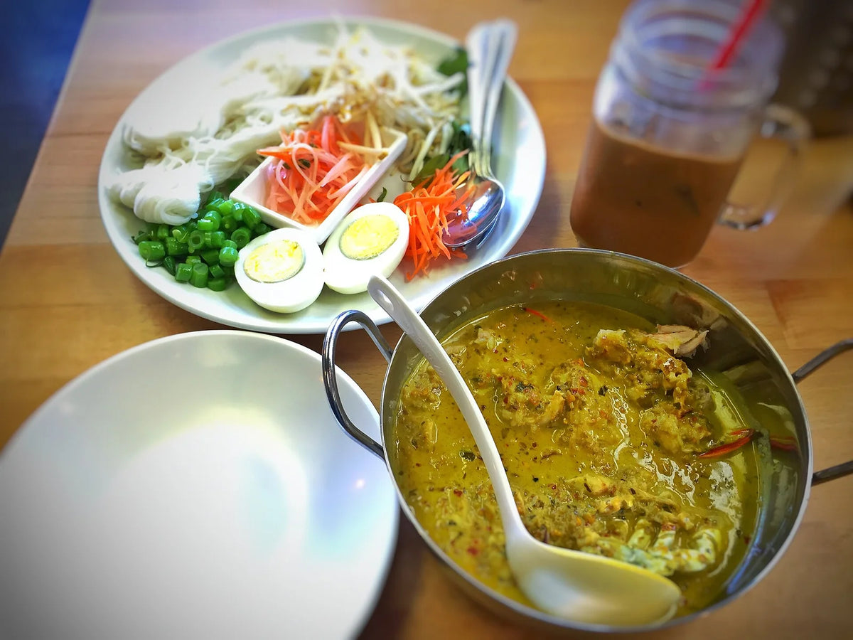 Phuket-style crab curry with kanom jeen rice noodles