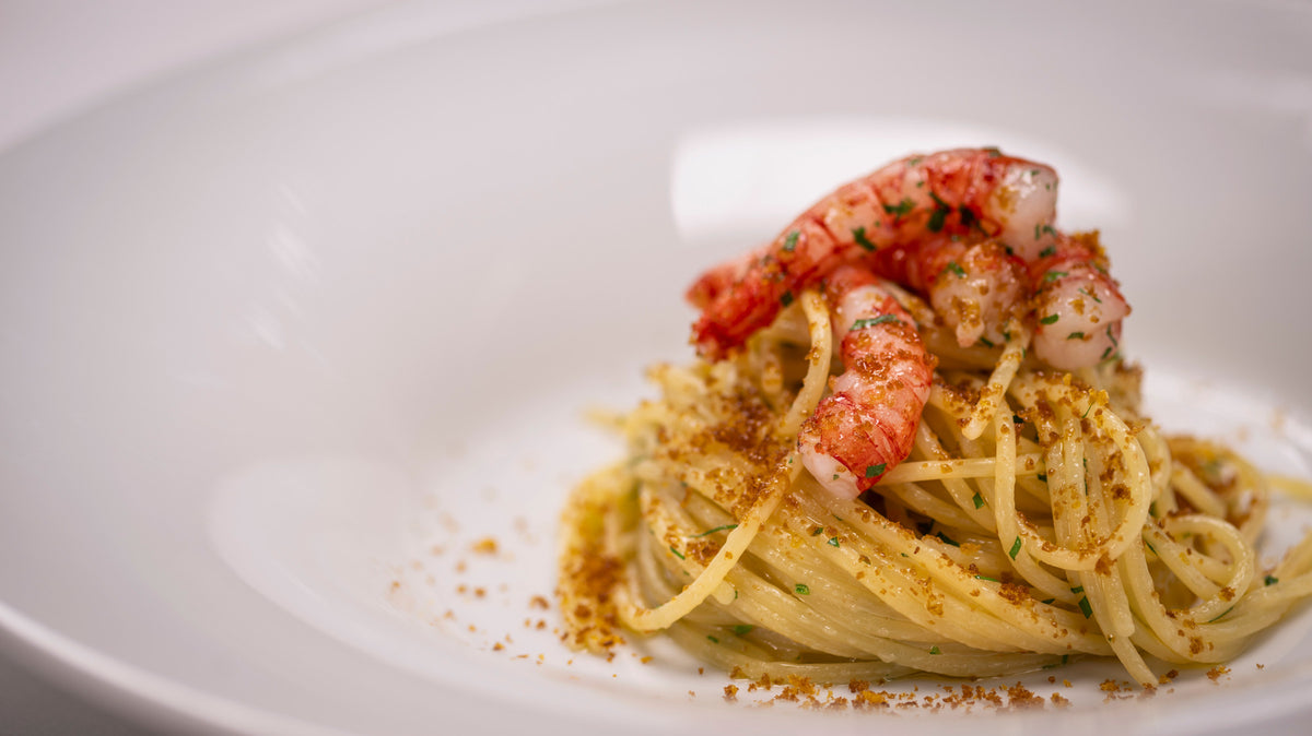 Spaghetti with red prawns and toasted breadcrumbs at Acqua Restaurant