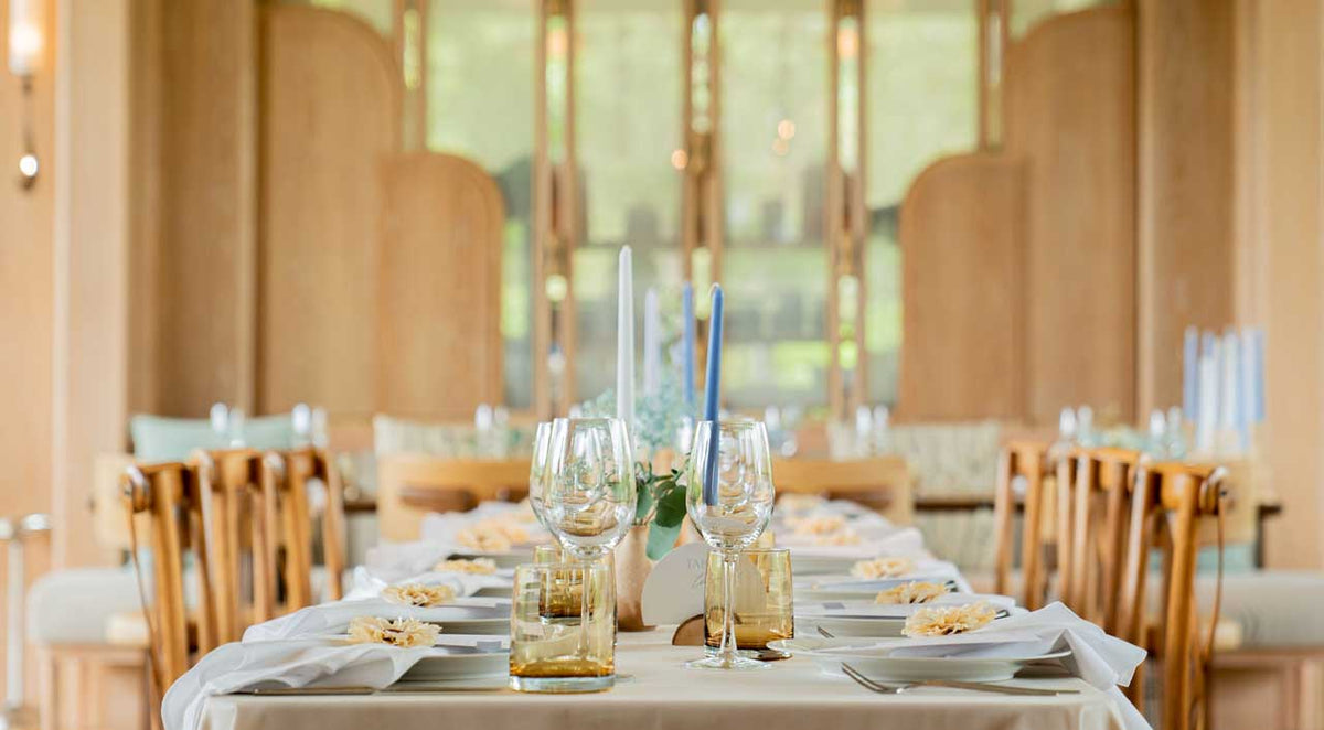 Long table set for dinner in the dining room at JAMPA