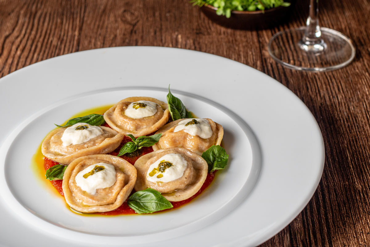Parmigiana bombette with basil pesto, tomato sauce and burrata at La Gritta