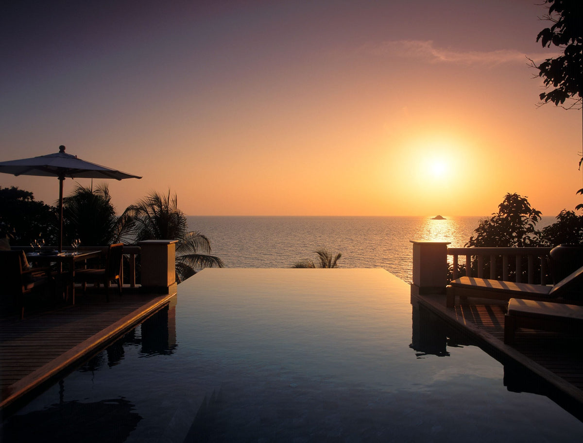 Infinity pool facing the Andaman Sea at sunset, Trisara