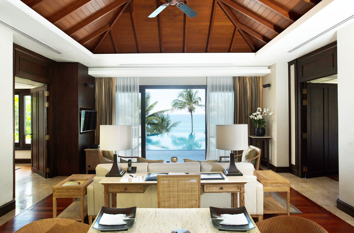 Pool villa living room with sea view at Trisara