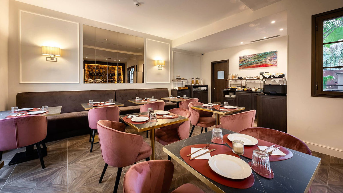 The breakfast room at BH Hotel Roma