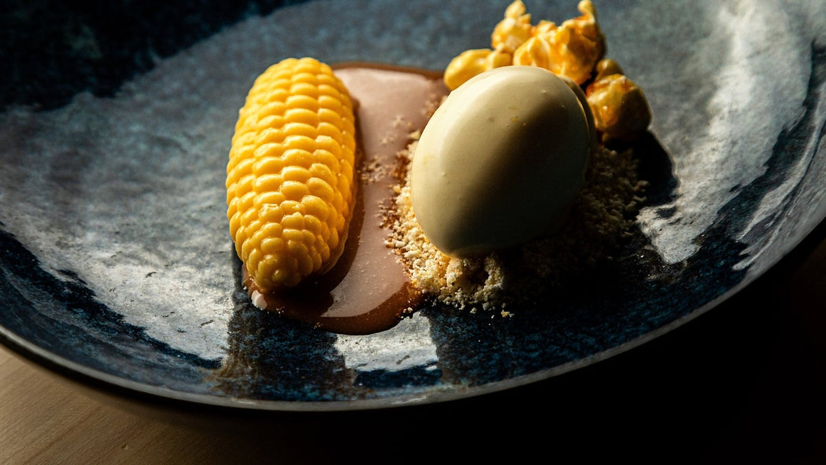 A dessert of corn, gelato and popcorn at Glass Hostaria