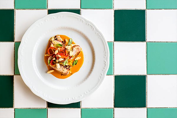 A plated dish on green-and-white tiles at Necci dal 1924