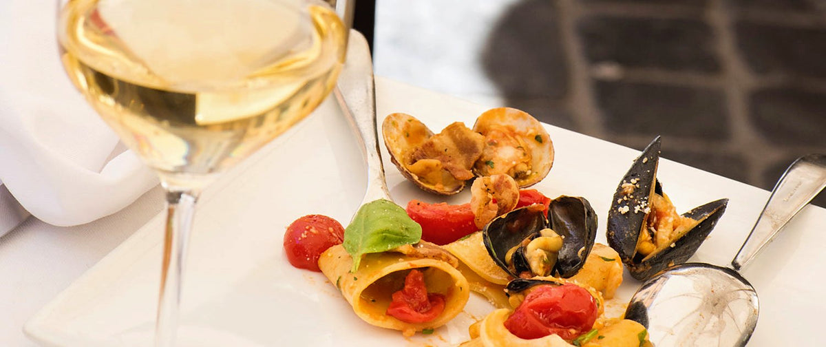 Seafood and a glass of white wine at Pierluigi