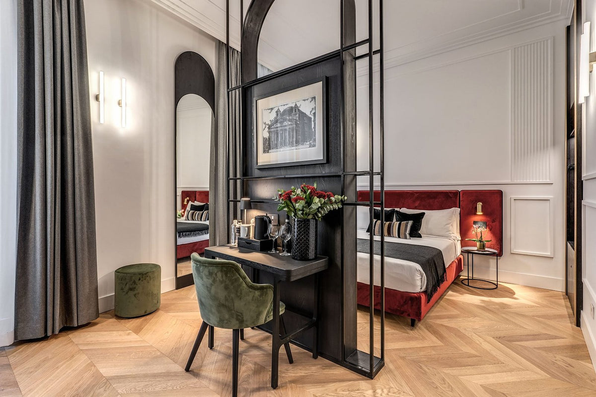 A room with herringbone parquet at Residenza Piranesi
