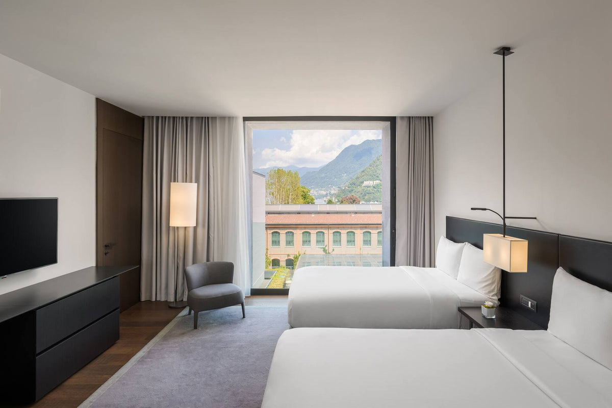 A twin room with lake view at Hilton Lake Como