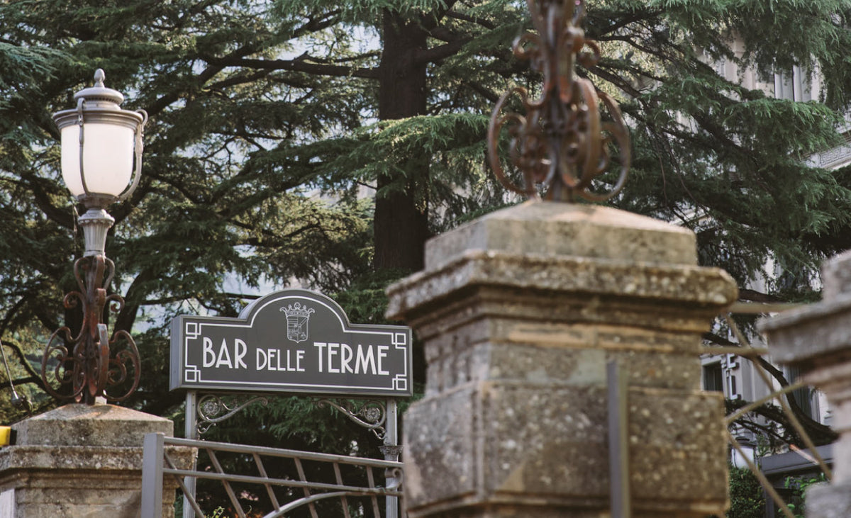 The Bar delle Terme sign in the garden of Albergo Terminus